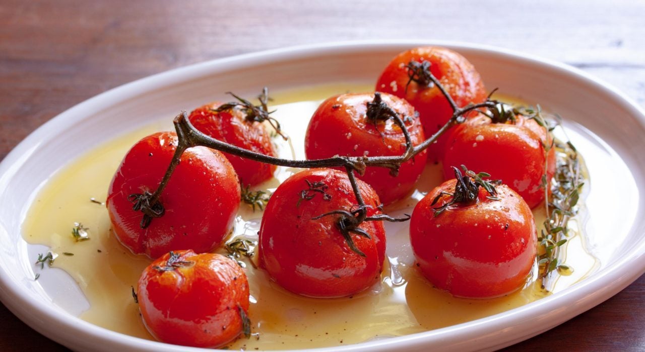 roasted tomatoes in a serving plate