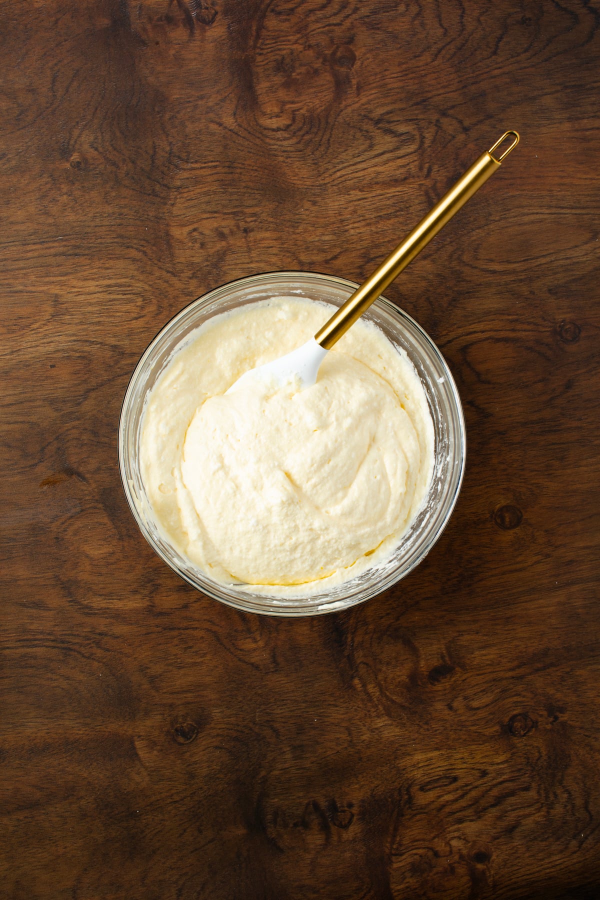 Egg whites are folded into the egg mixture gently and slowly.