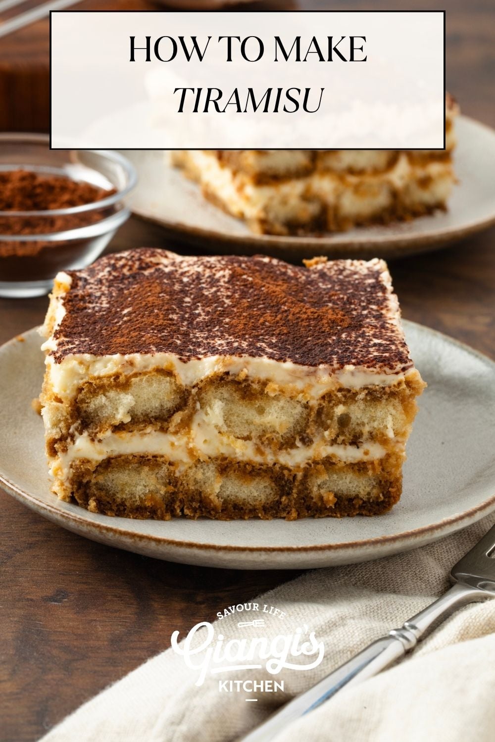 Slice of tiramisu served on a dessert plate.