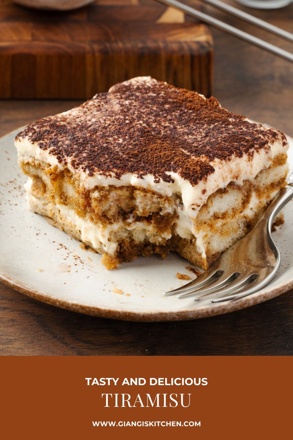 Slice of tiramisu served on a dessert plate.