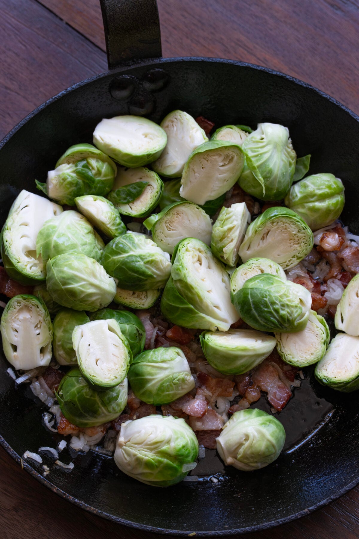 Add the Brussels sprouts and sauté them to high heat to give them a nice golden outside.