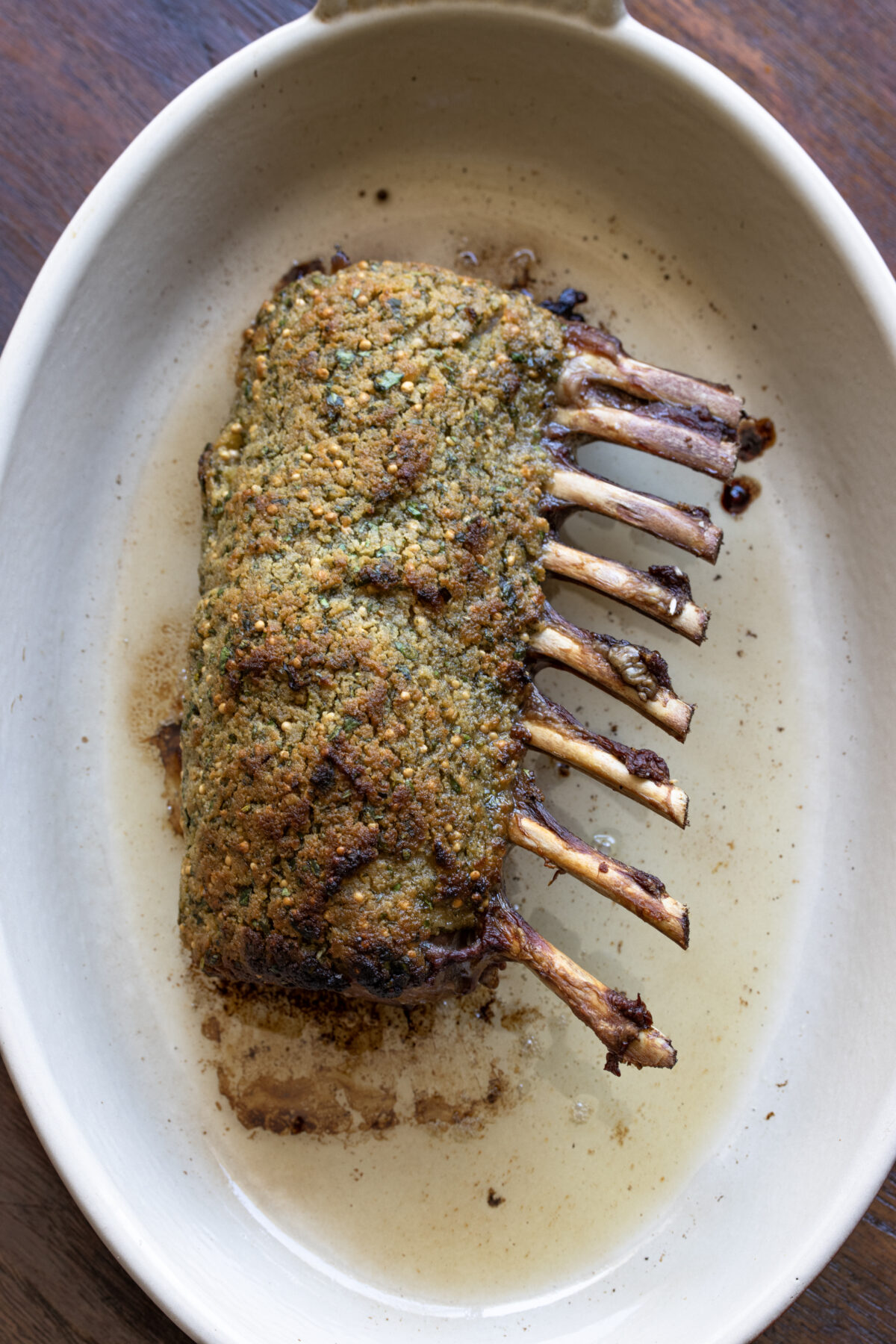 Rack of lamb with crust done and removed from the oven to let rest.