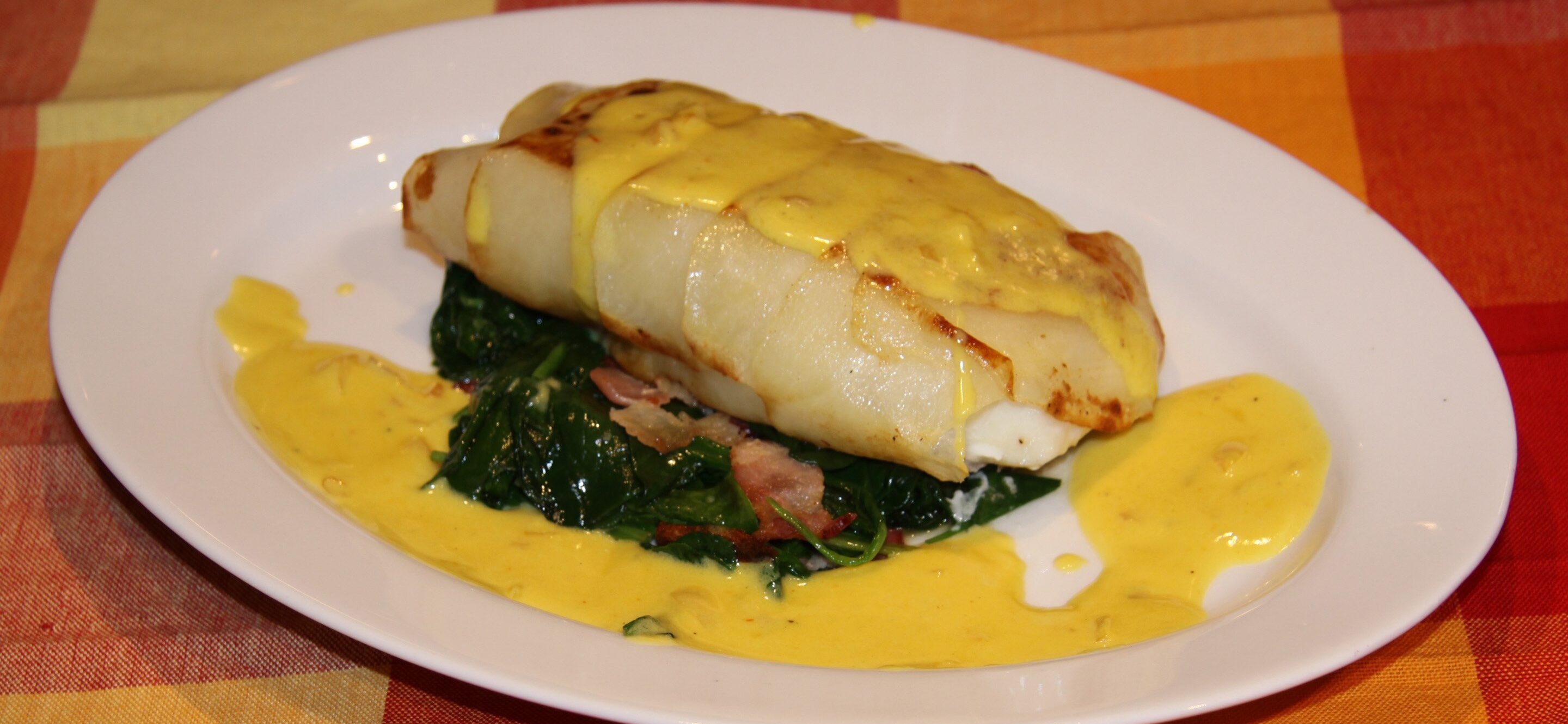 potoates crusted sea bass with saffron sauce