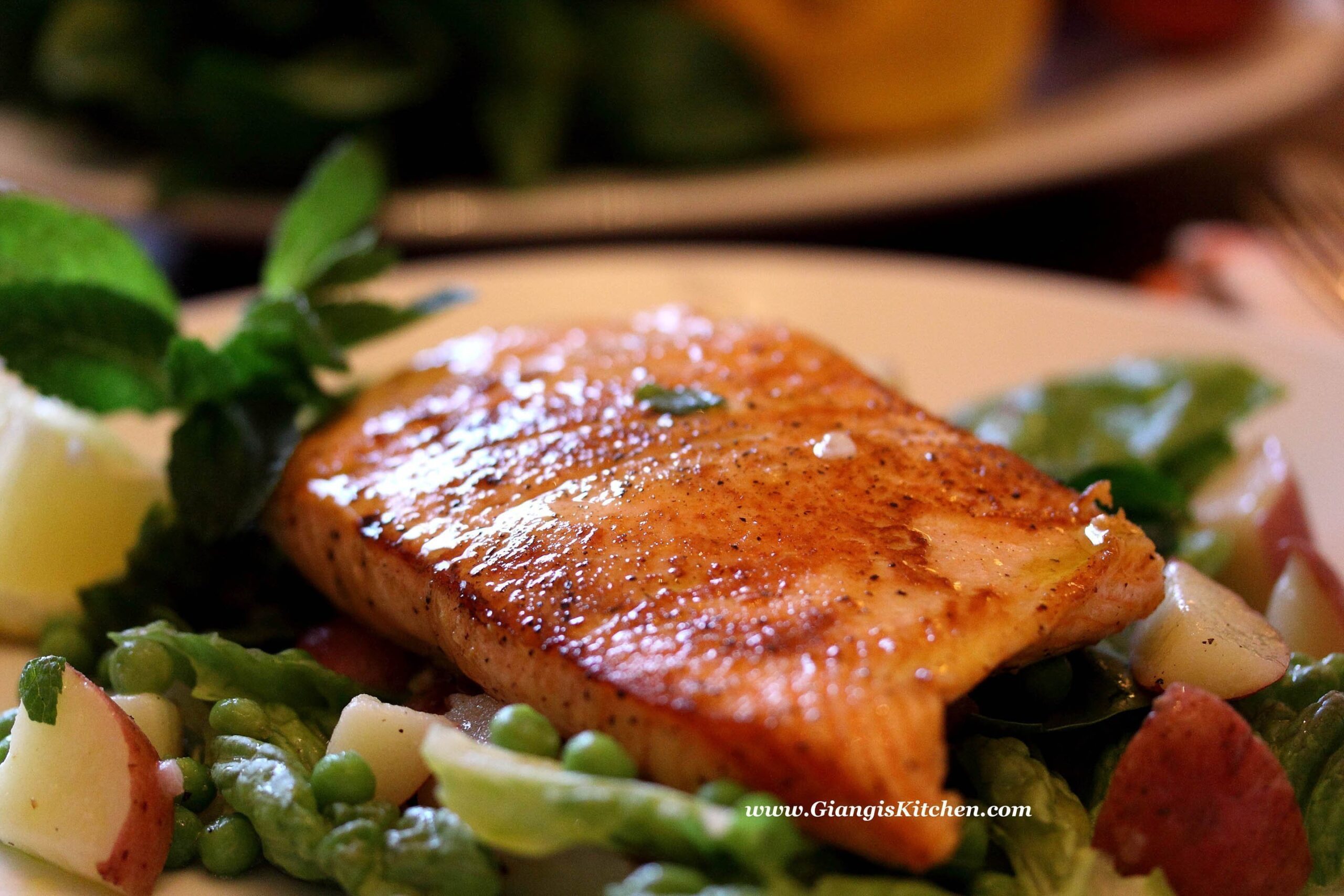 seared salmon with peas, potatoes and mint