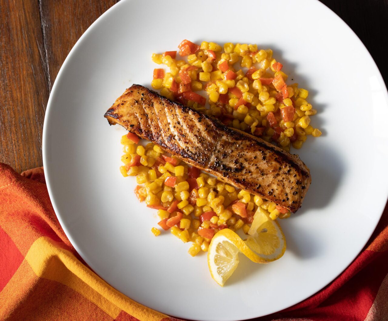 Pepper Crust Salmon With Creamed Corn And Bell Peppers