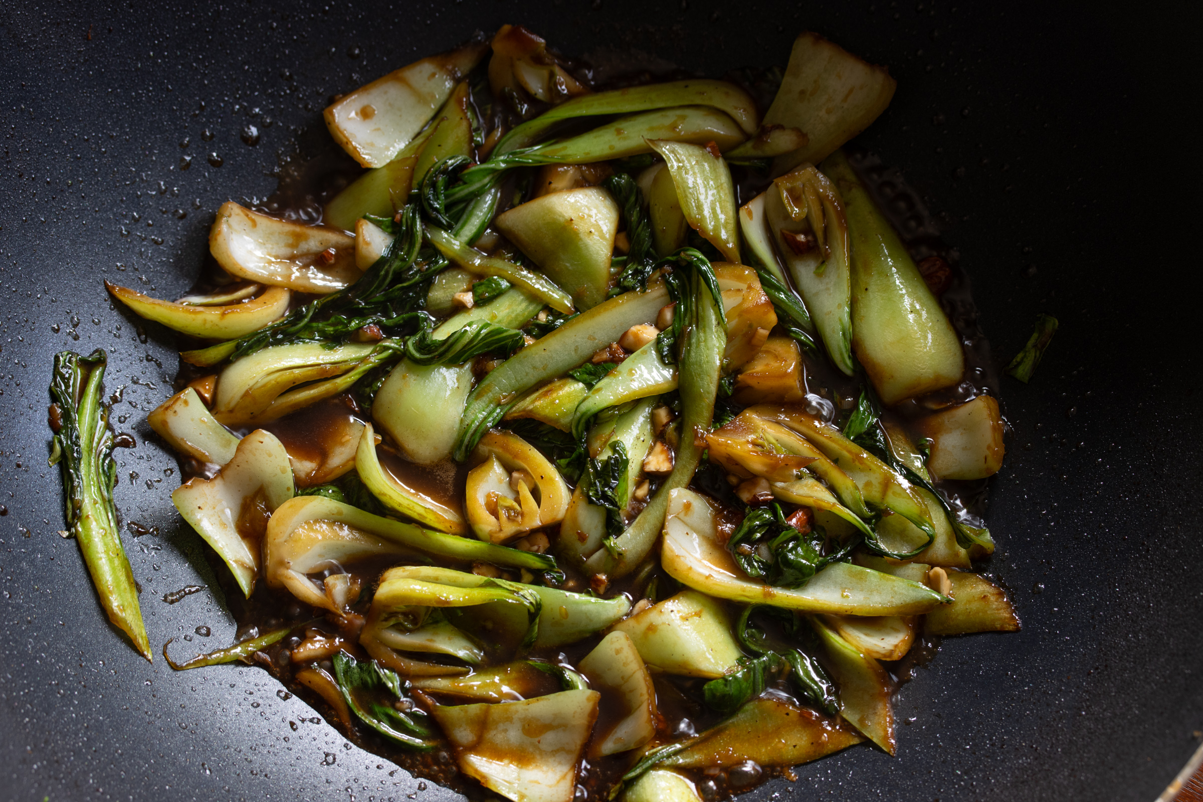 Finished bok choy in the wok.