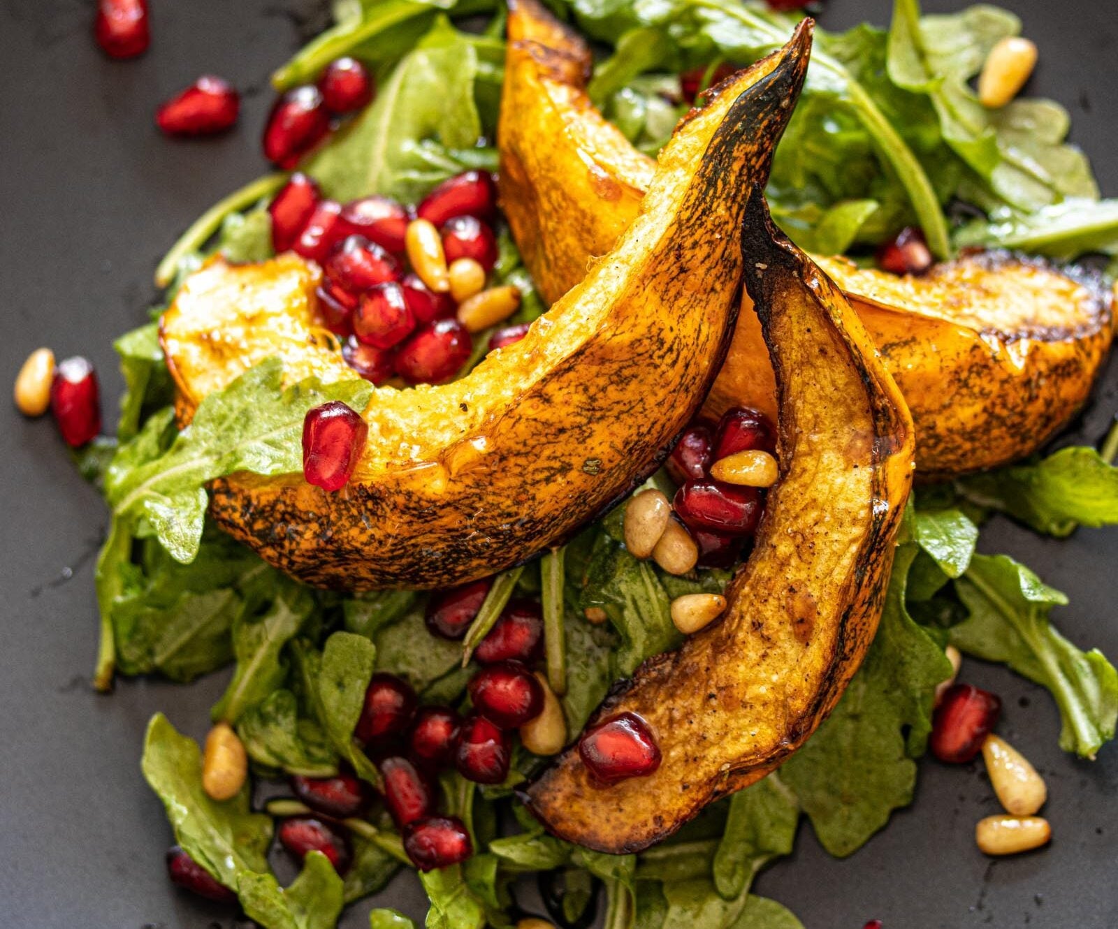Pomegranate Seeds, Acorn Squash Arugula Salad Pomegranate Seeds, Acorn Squash Arugula Salad