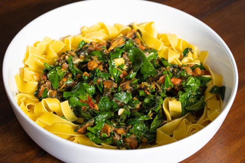 Tomato, Chard, Kale, Spinach with Pappardelle Pasta served