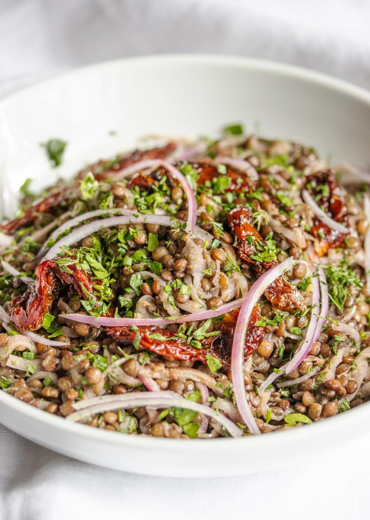 lentils with sun-dried tomatoes, onion and fresh herbs