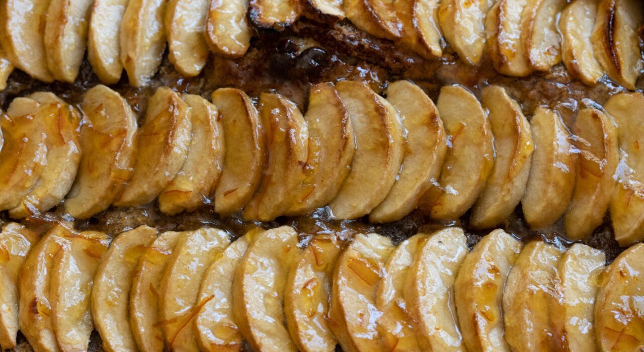 apple tart with hazelnut frangipane Close of view of the apples on the top of the tart.