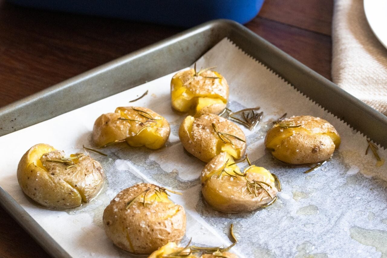 roasted smashed potatoes are the perfect side to your lamb