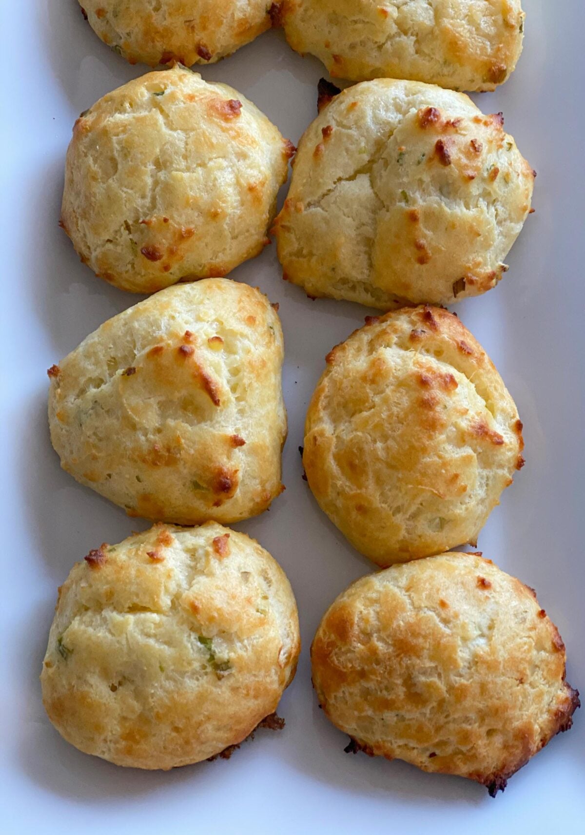 Gougeres with cheese and scallions Gougeres with cheddar cheese.