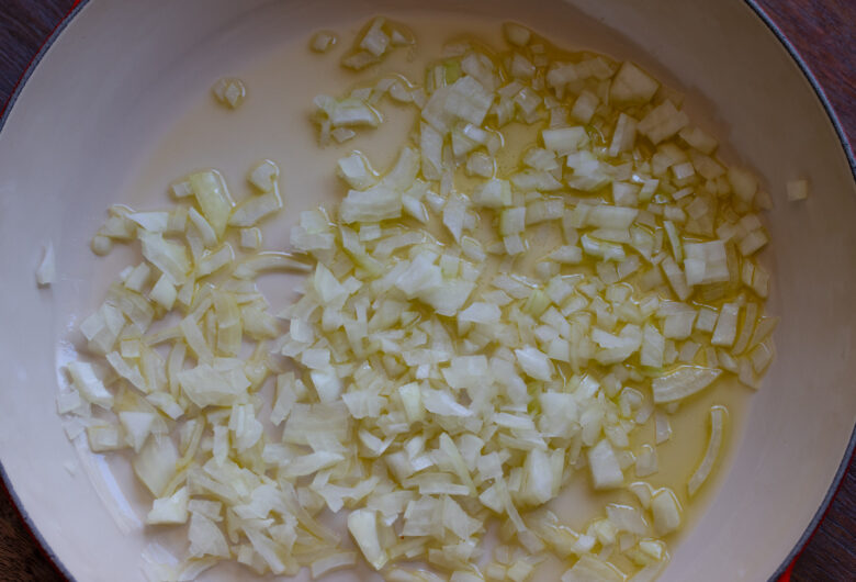 Onions been sauteed with olive oil.