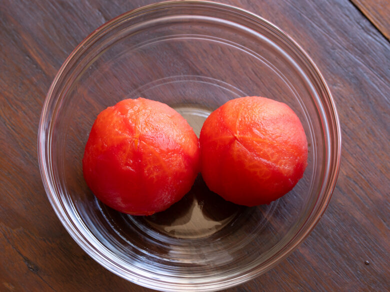 Skin removed from the tomatoes after blanching.