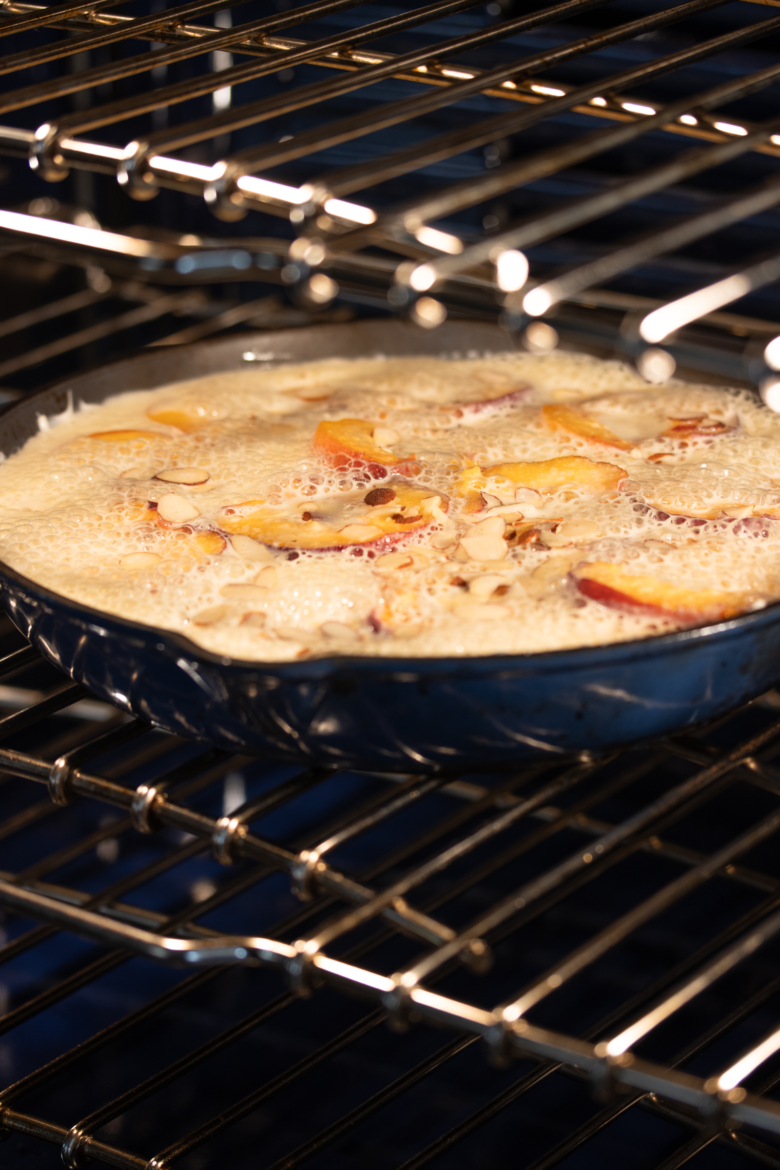 Peach Clafoutis in the oven baking