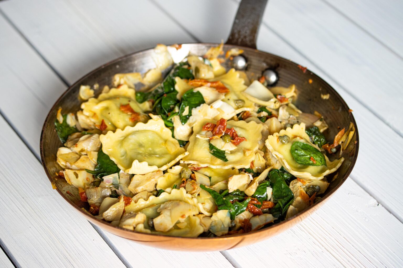Ravioli wioth artichokes hearts, capers, sun dried tomatoes, spinach