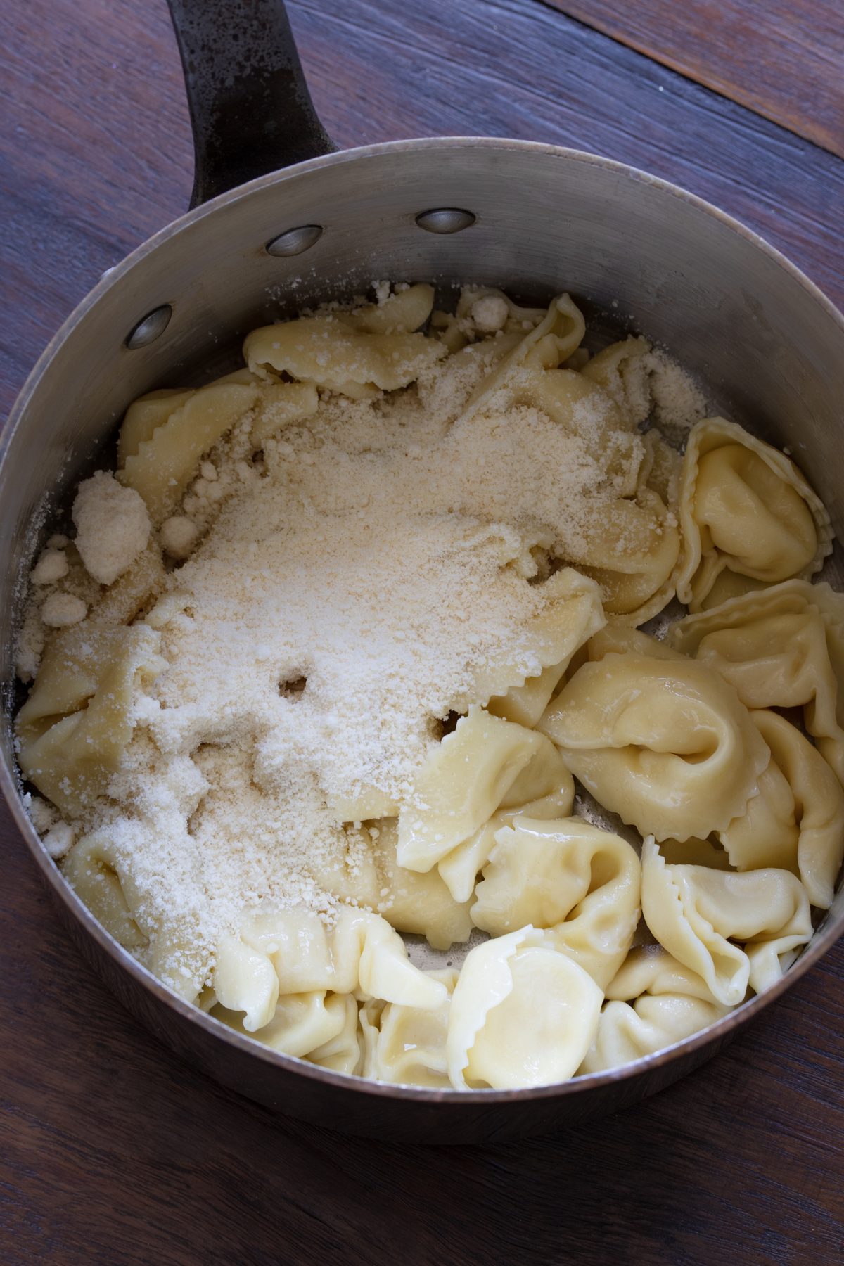 Freshly fine grated Parmesan cheese added to the tortellini with butter. 