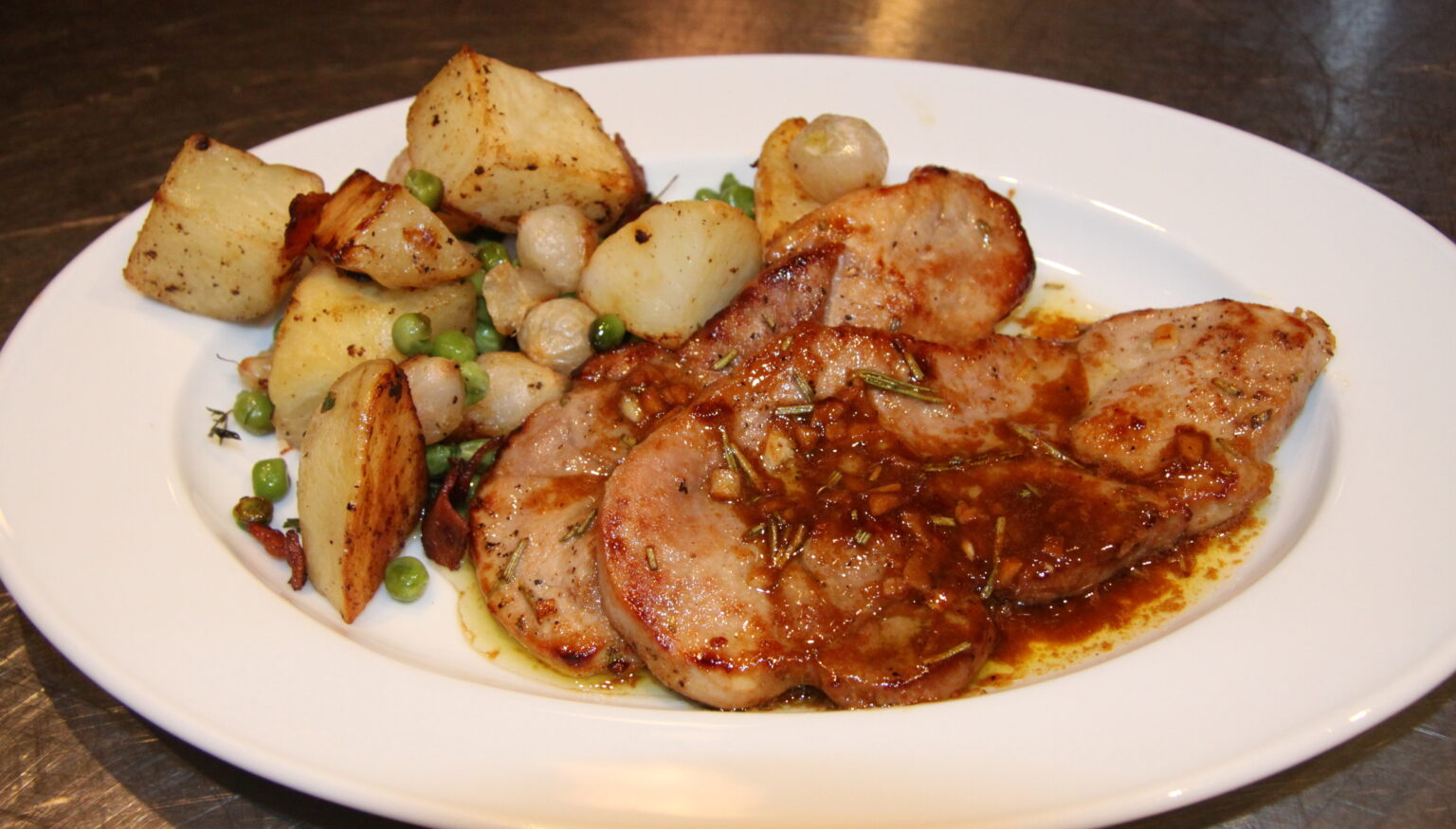 White balsamic pork cjops with roasted potatoes and peas