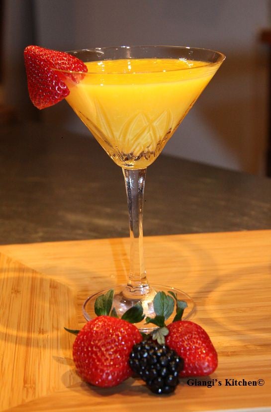 mango martini cocktail served in a crystal glass