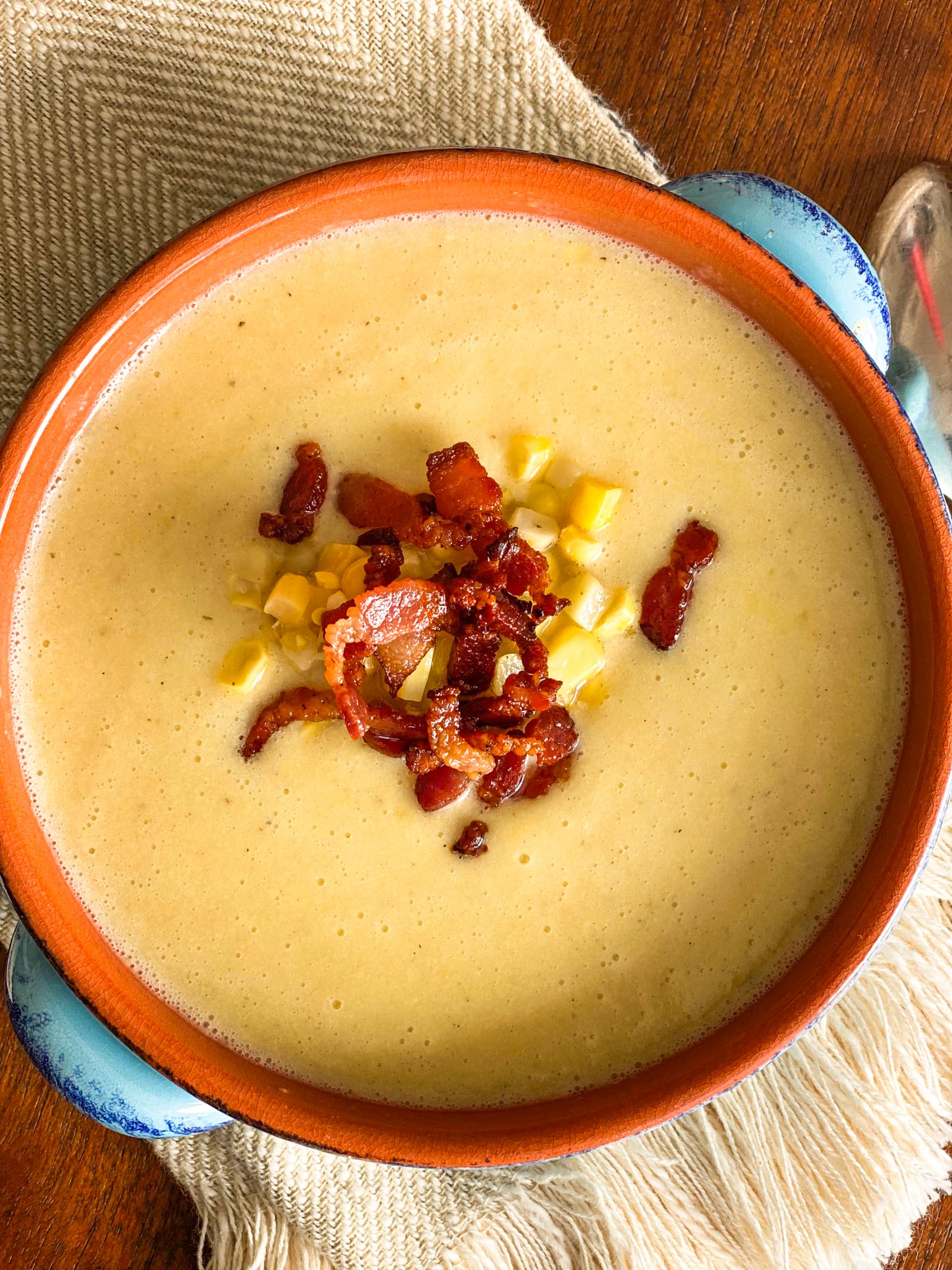 corn chowder top view blue bowl