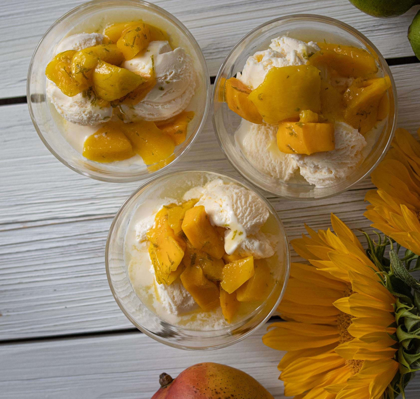 mangoes with rum and vanilla ice cream