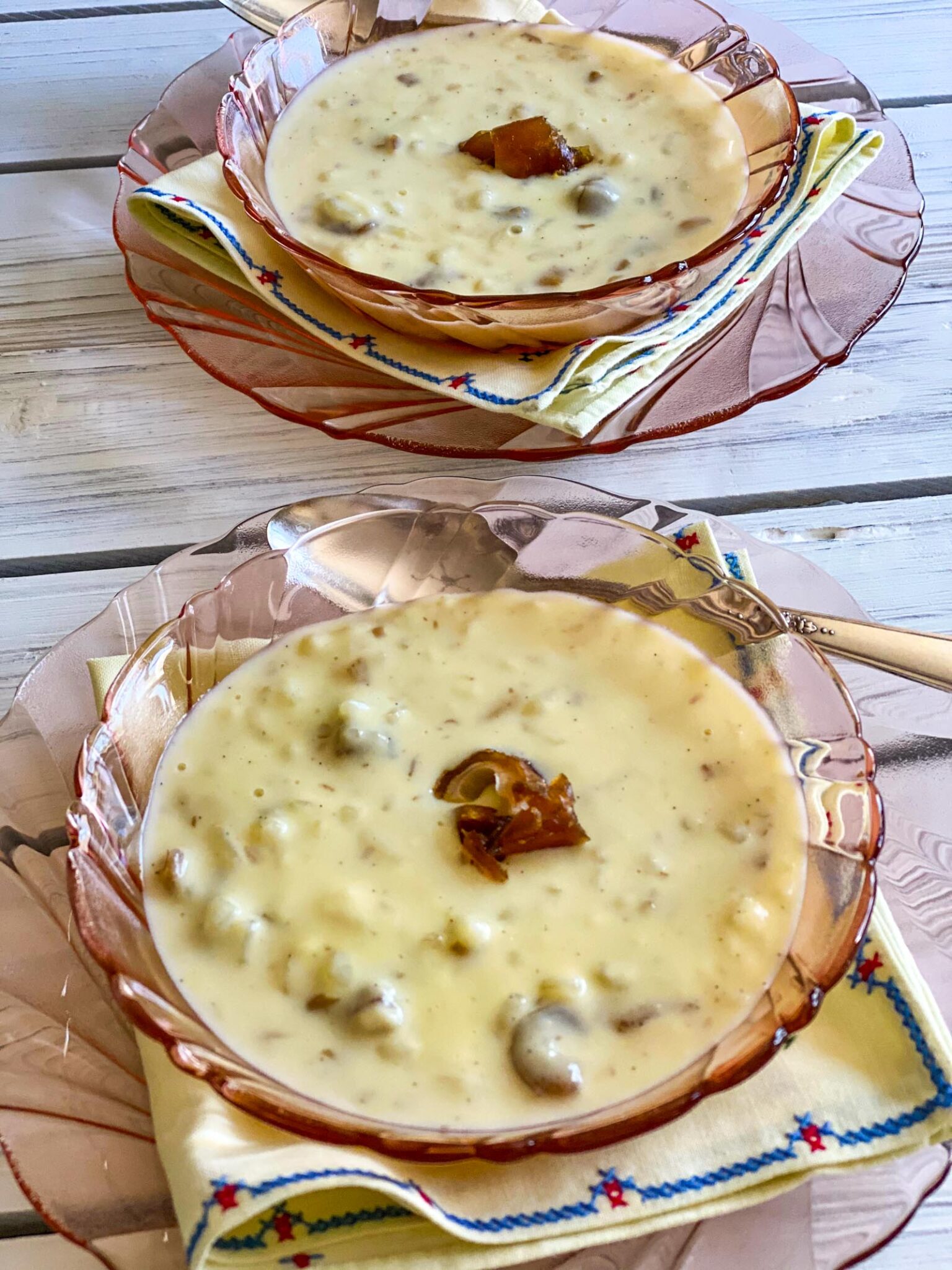 rice pudding in a pink glass container