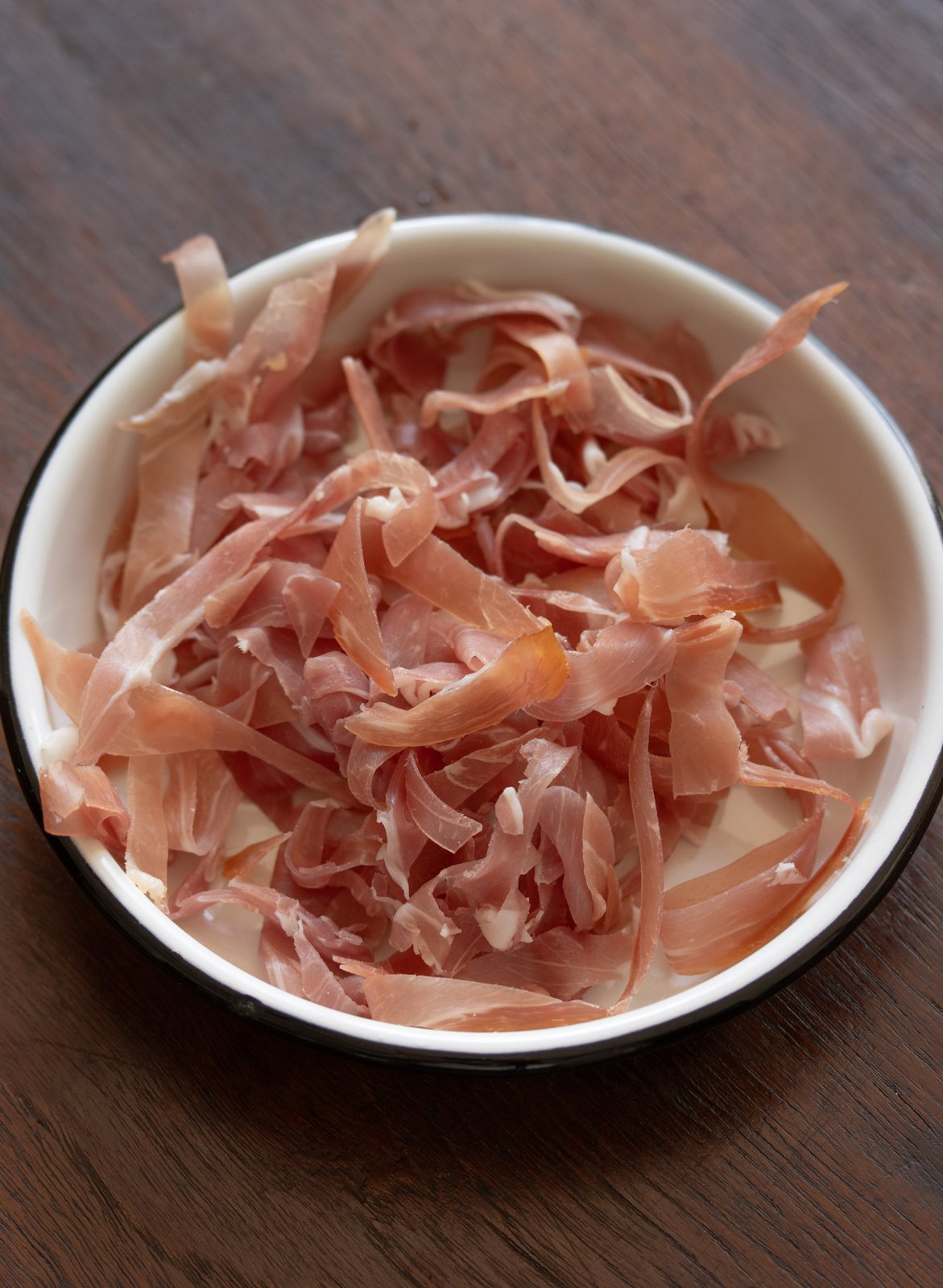 sliced prosciutto and egg whisked with heavy cream