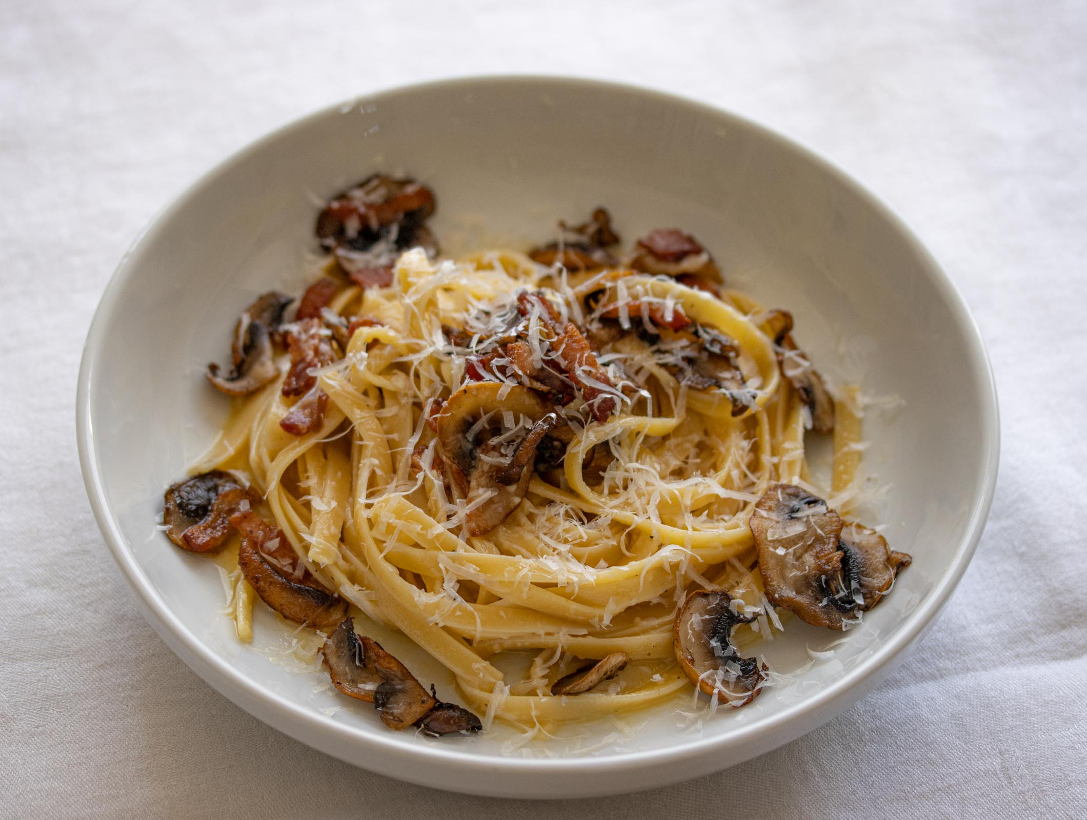 linguine pasta with mushroom on a serving plate