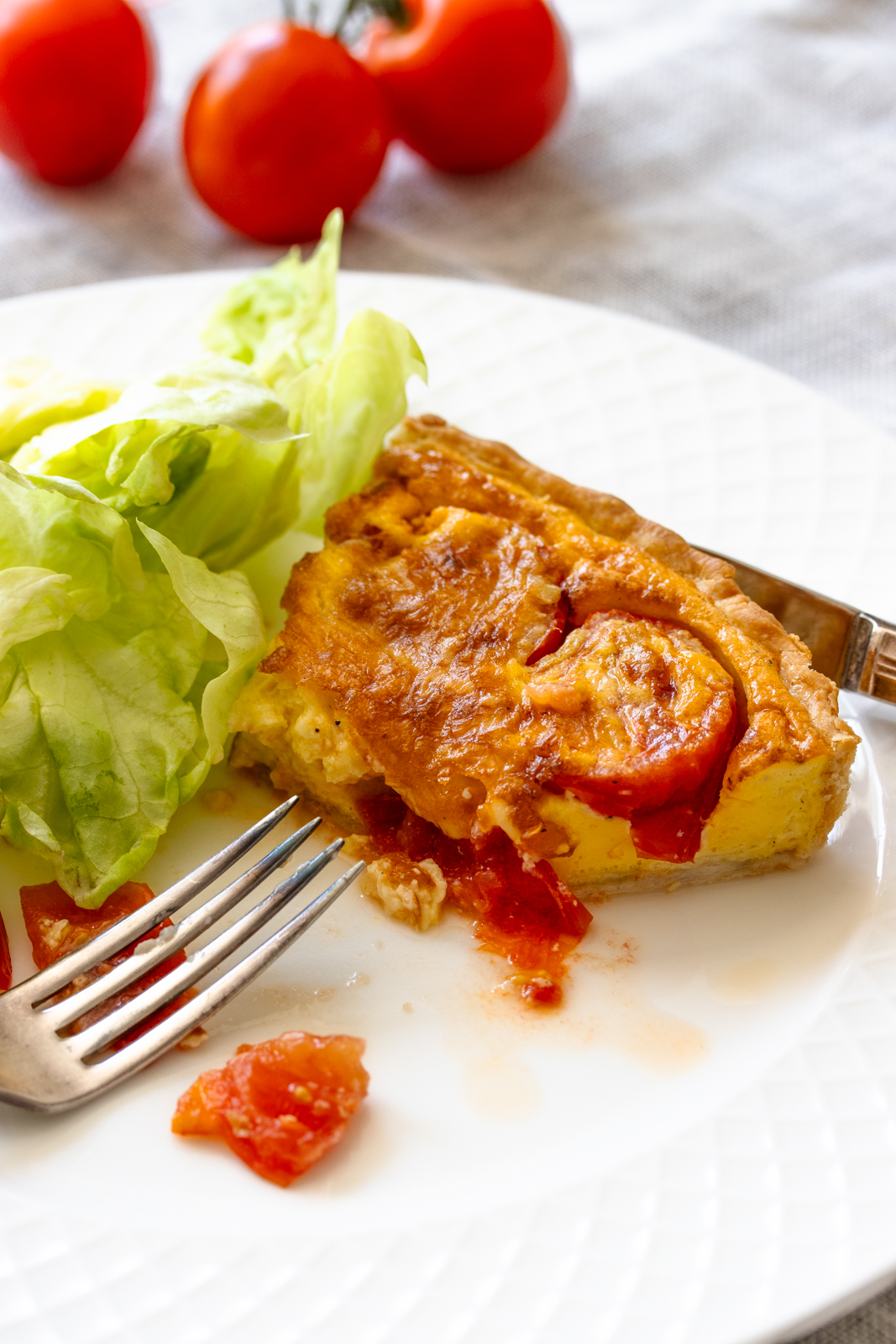 Tomato Quiche on a white plate