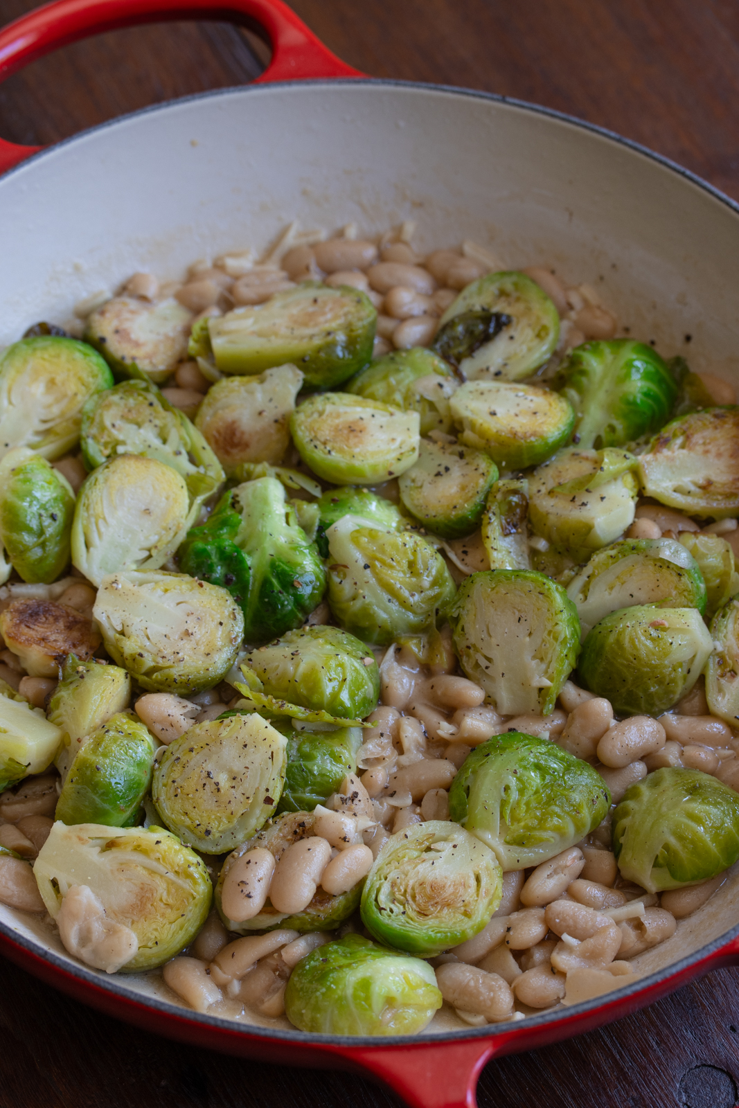 brussels sprouts and white beans while cooking