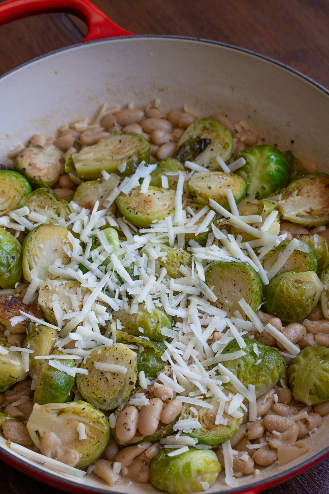 brussels sprouts and white beans in skillet finished
