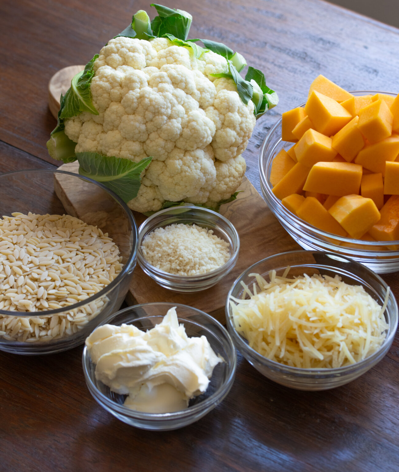Ingredients needed to create your gratin butternut squash, cauliflower and orzo pasta