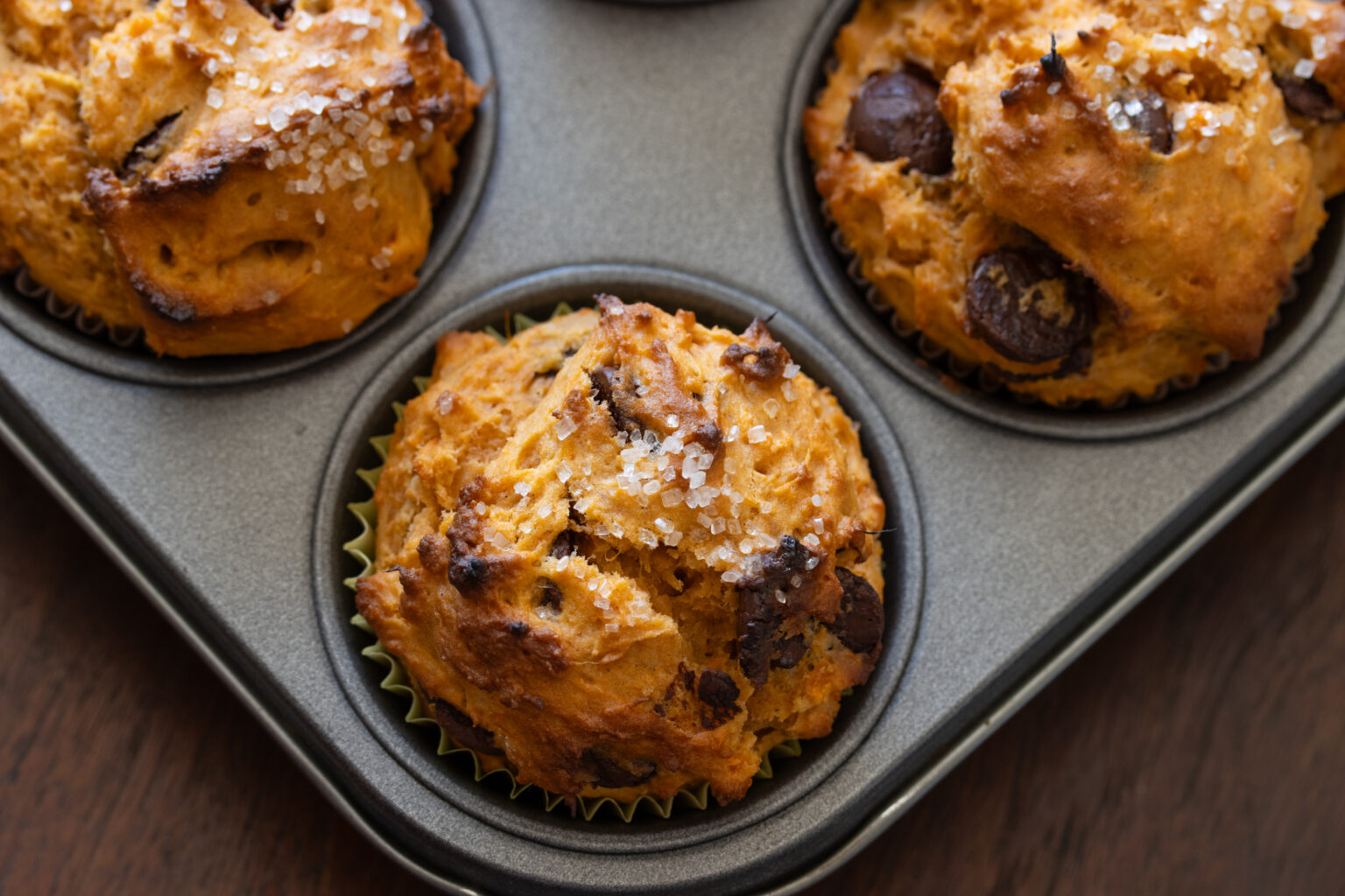 Sweet potatoes muffins in the baking sheet.
