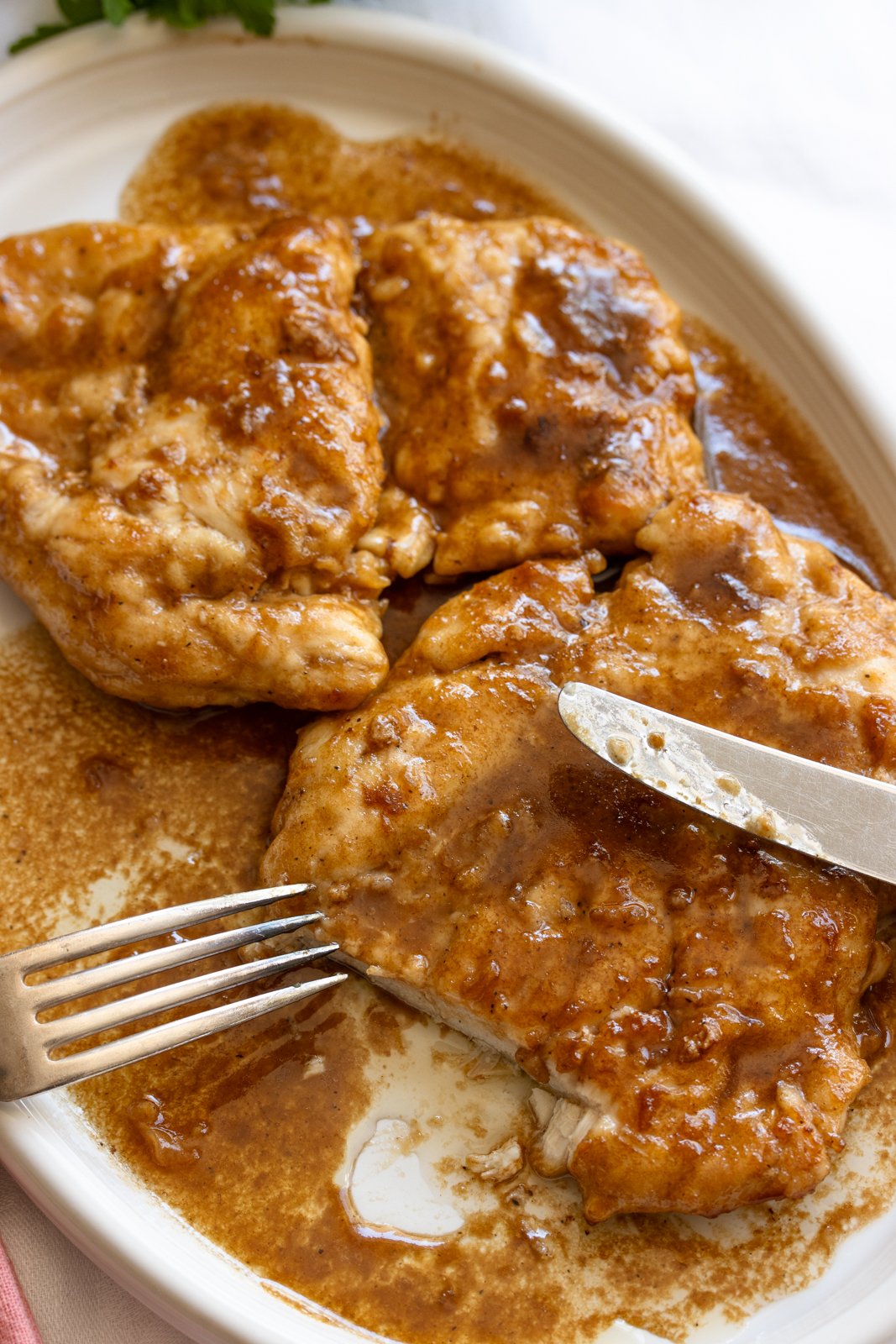 chicken marsala on a white serving plate