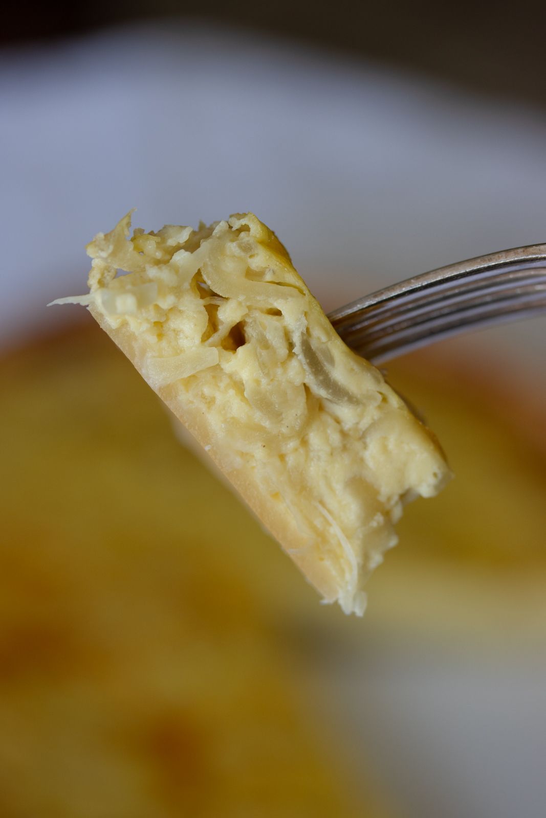 onion tart on a fork