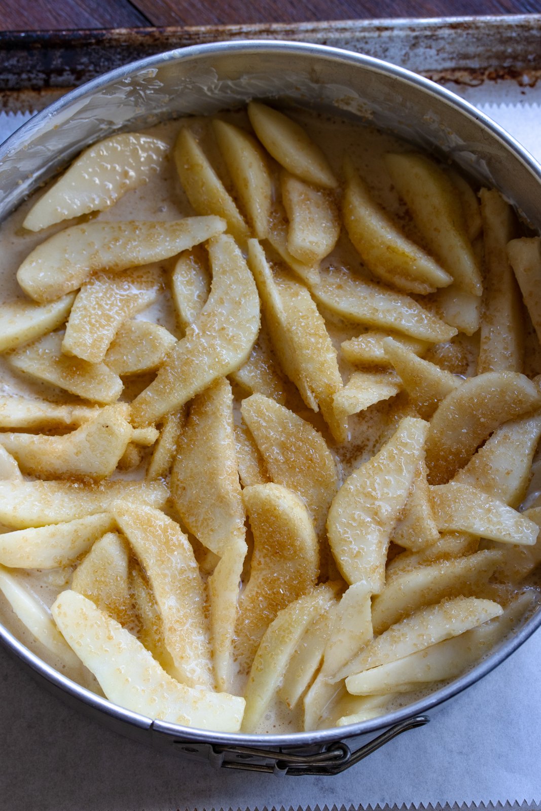 pears and batter in the springorm mold ready to go in the oven