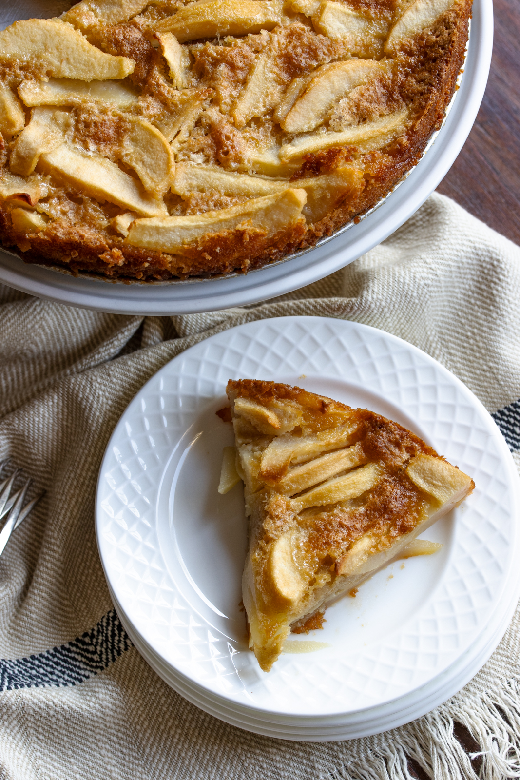 pear cake slice on a white plate