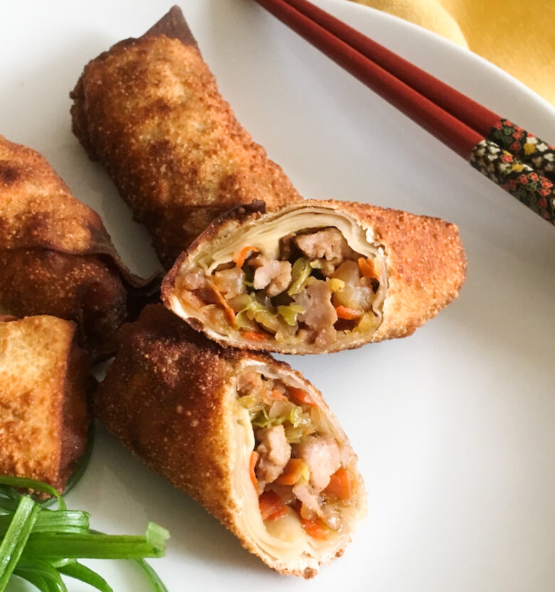 egg rolls on a white plate
