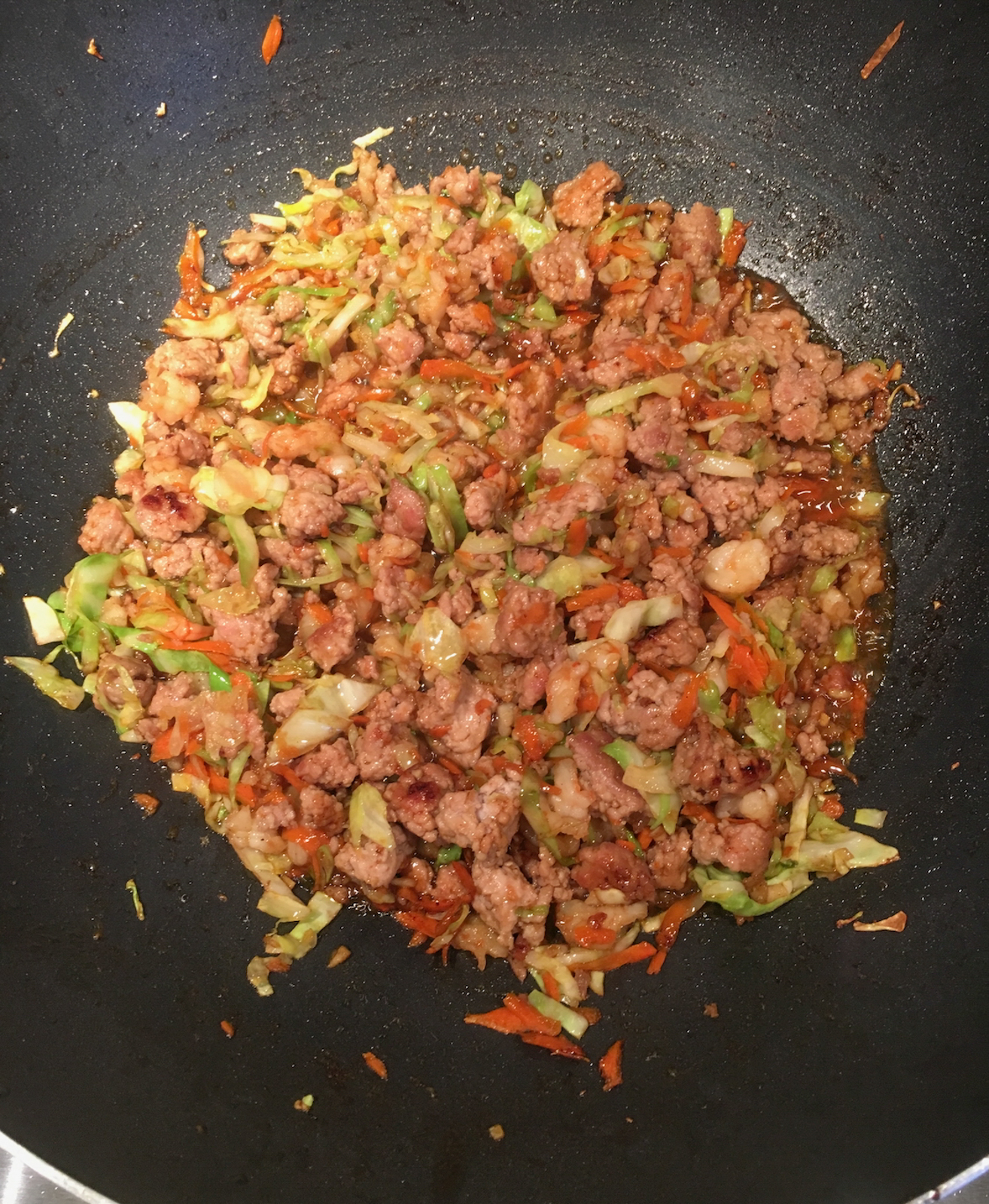 egg rolls ingredients in the wok cooking