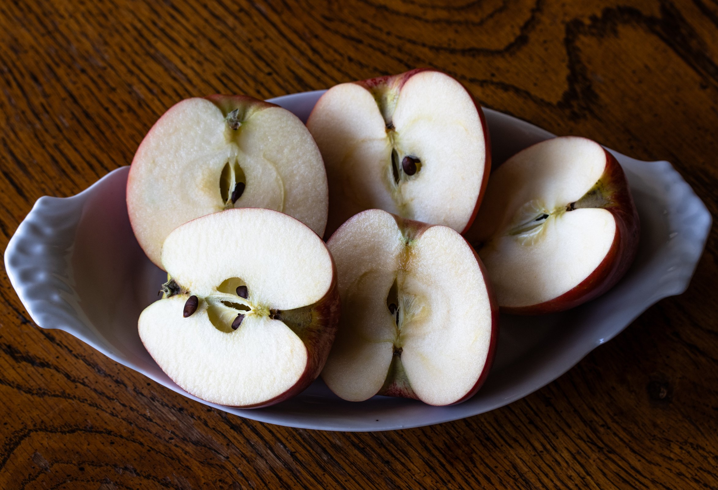 Apples sliced in half.