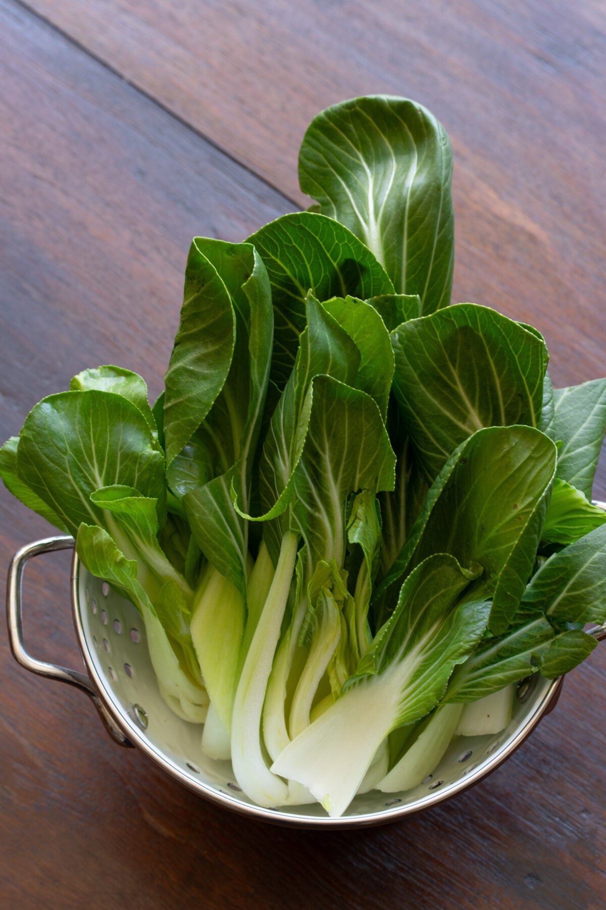Cut and well washed baby bok choy, leaving intact the smaller pieces.