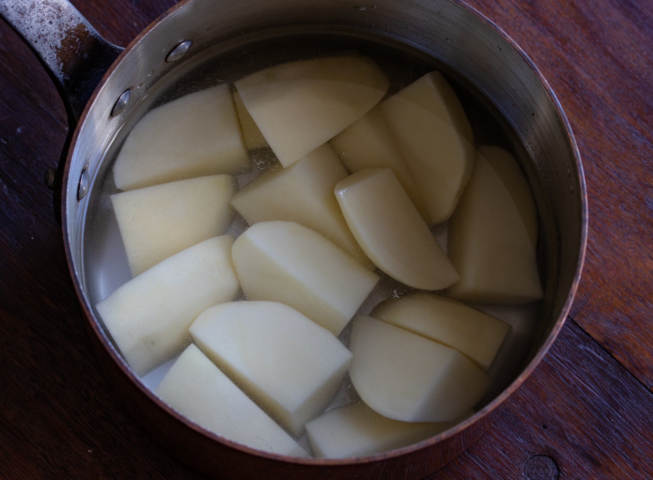 potatoes in a pan covered with water