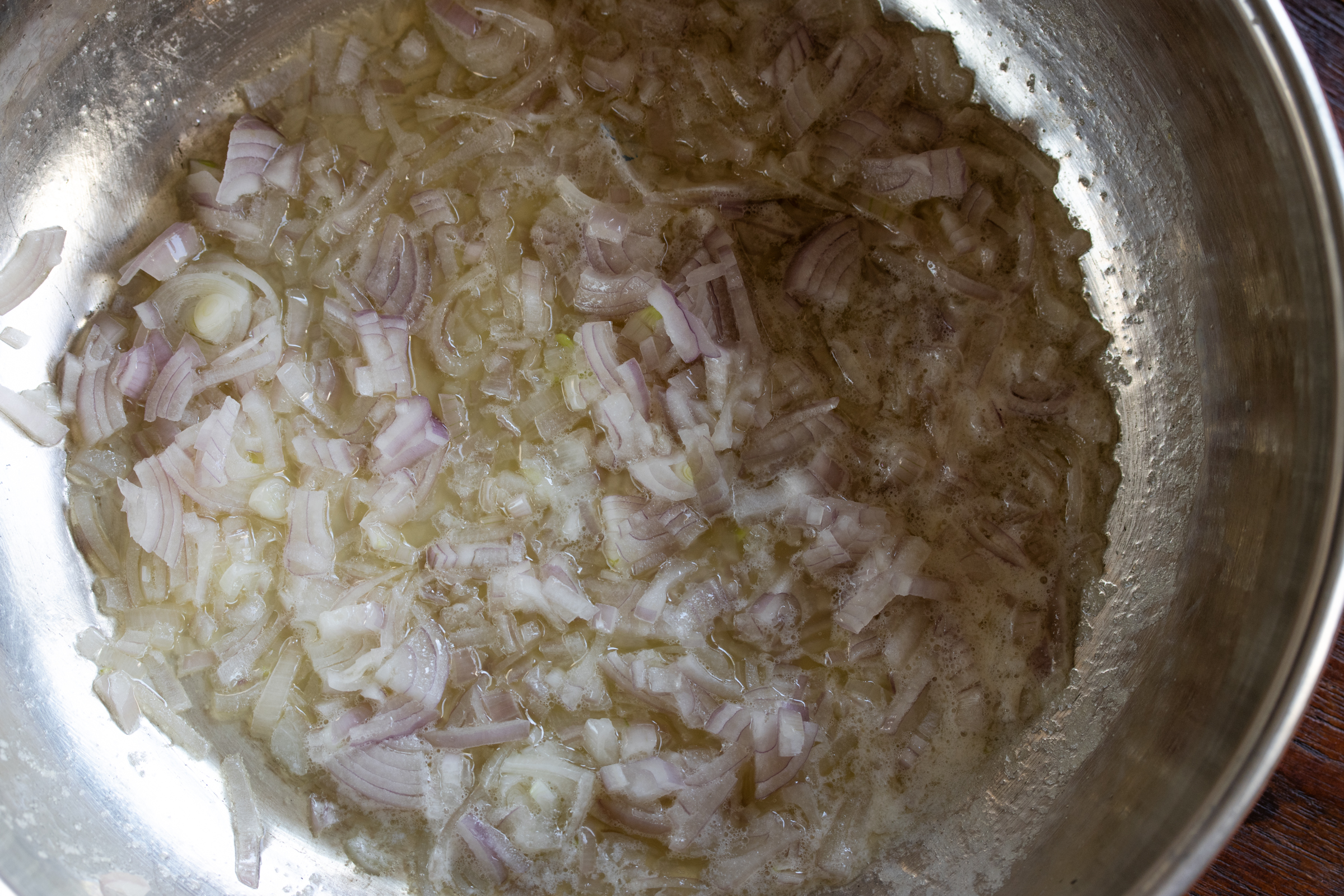 shallots in pan wiht butter for risotto milanese