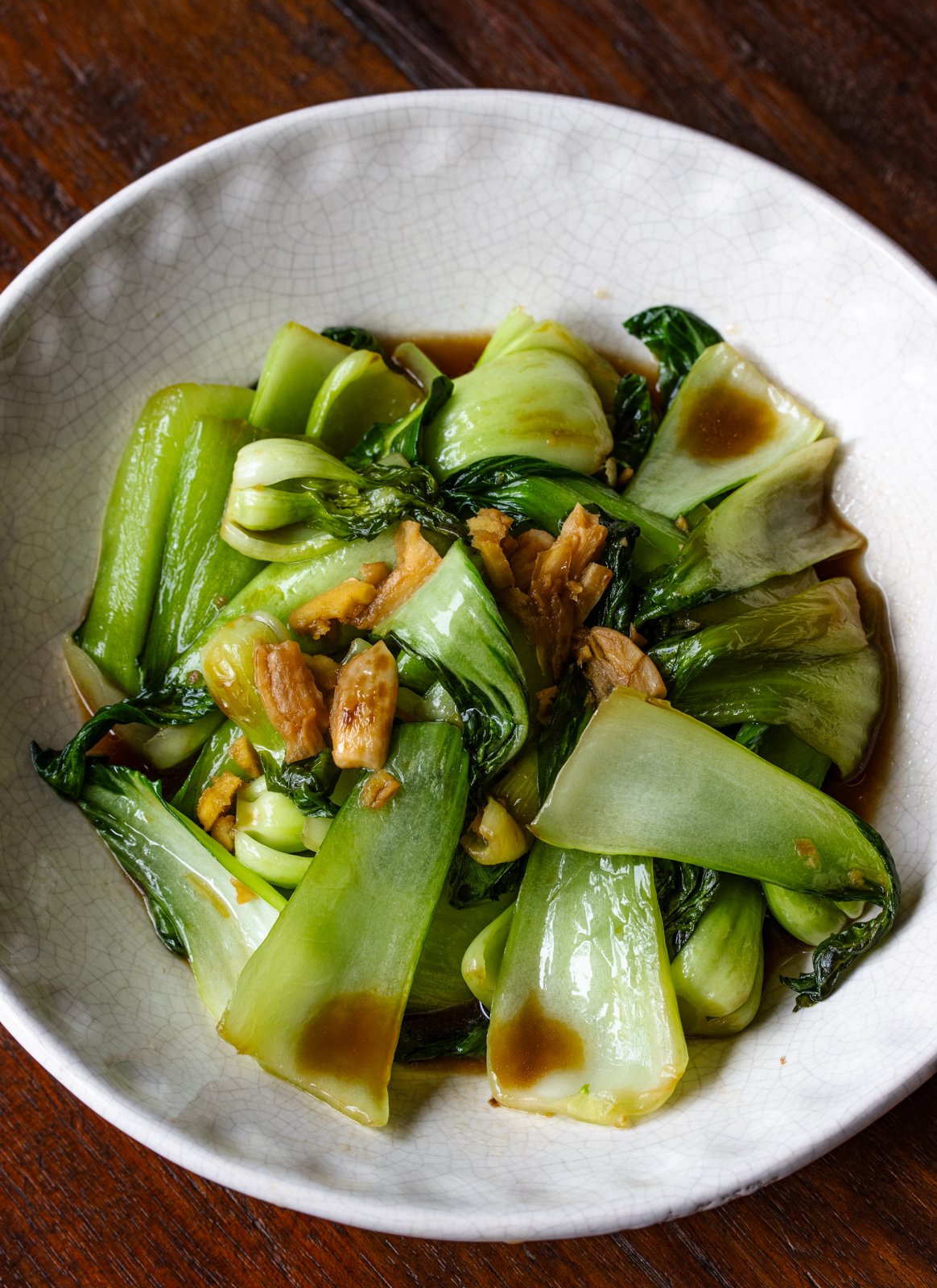 bok choy stir fry in a white dish