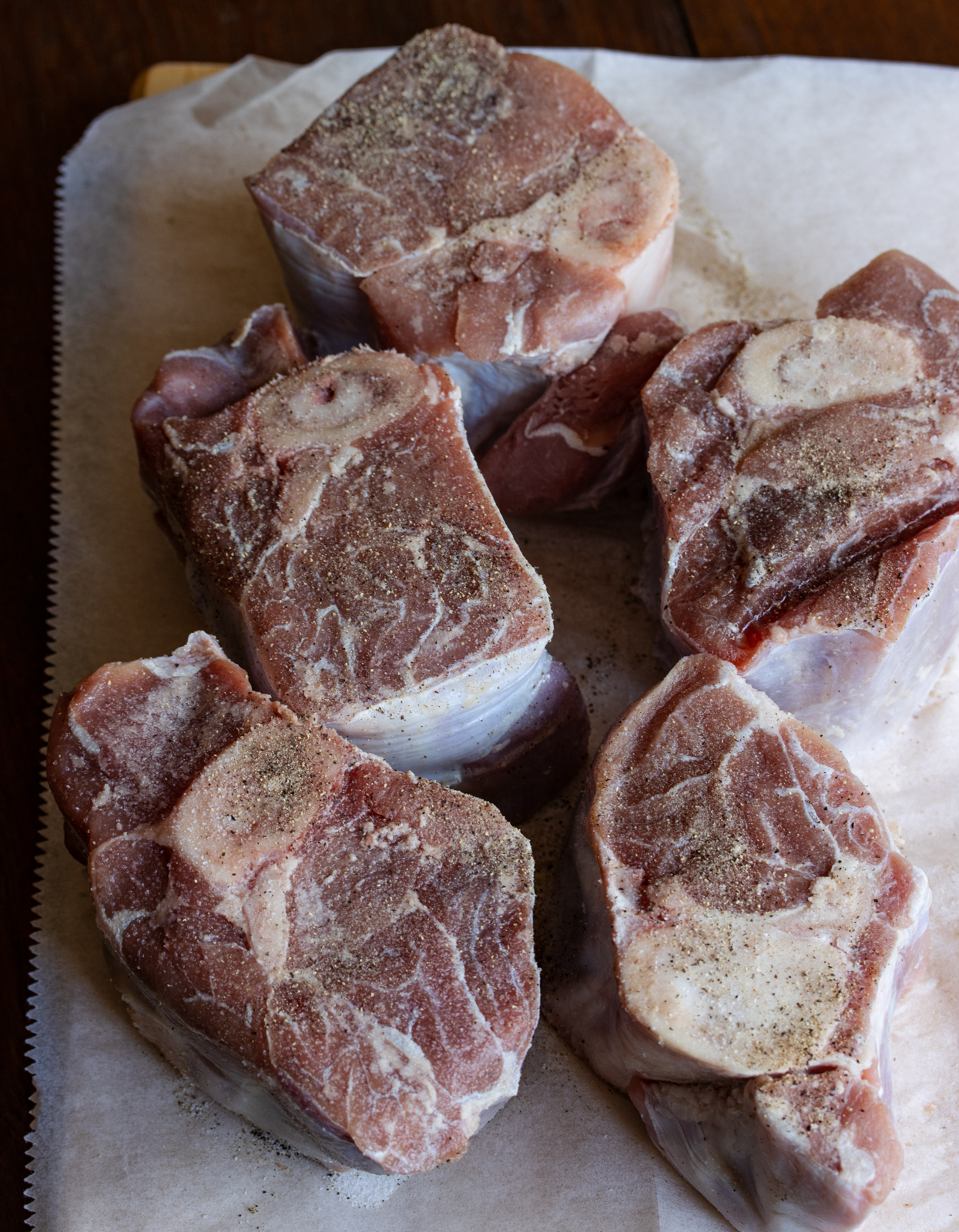 seasoned with salt adn pepper the veal shanks