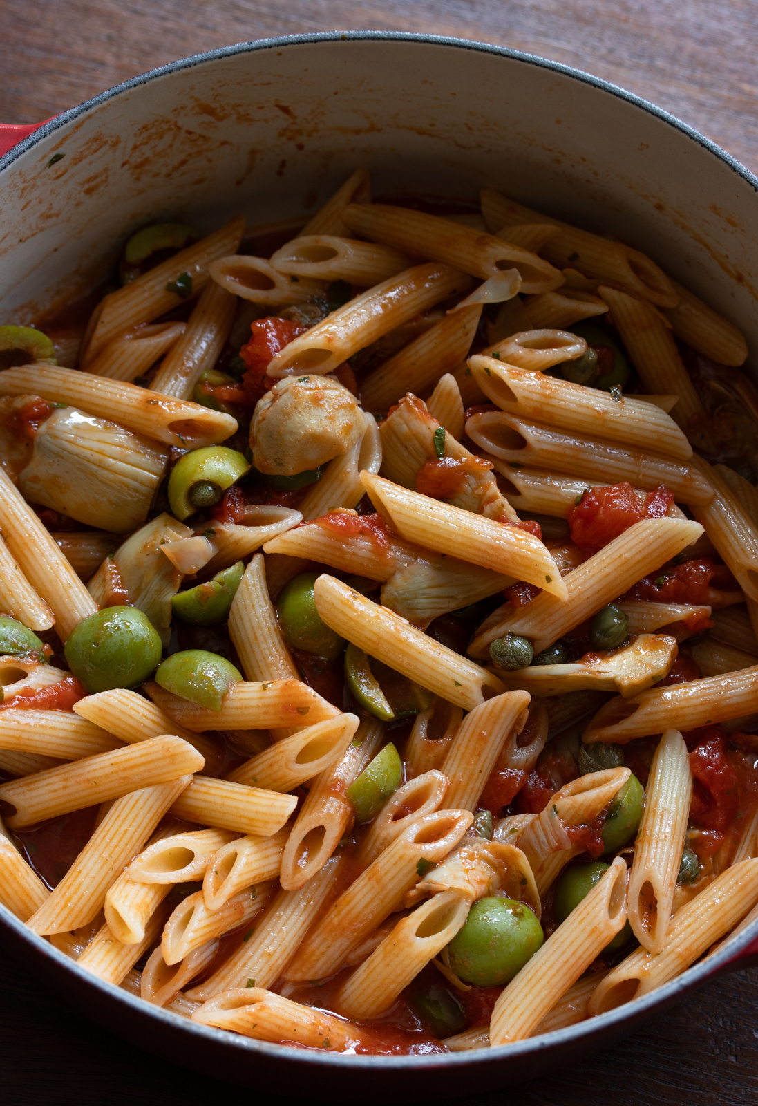 penne pasta added to the tomato sauce