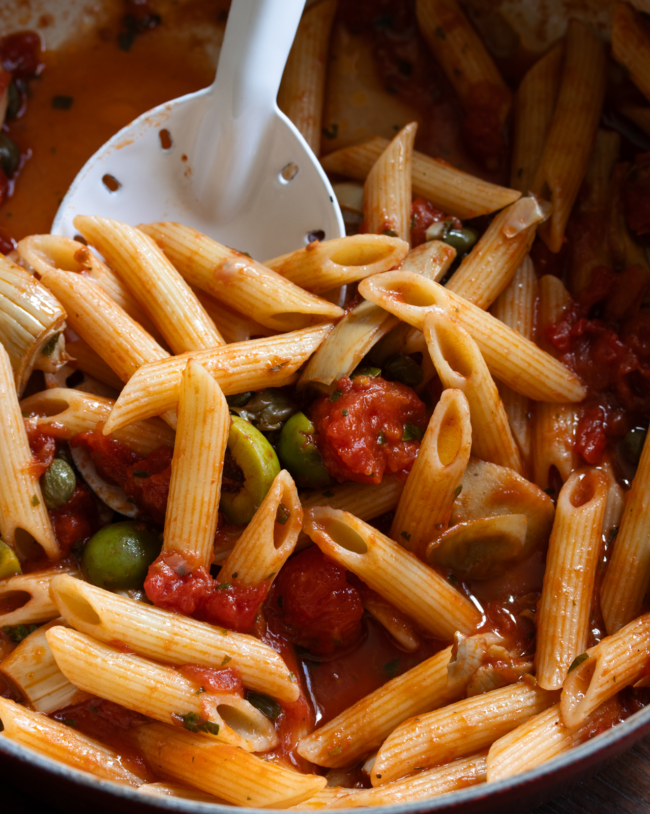 pan with the pasta and a serving spoon