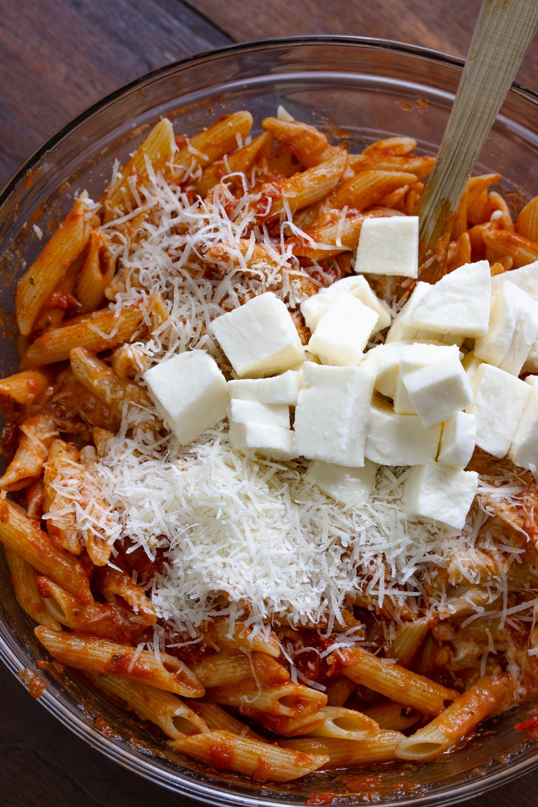 add 3/4 of the mozzarella