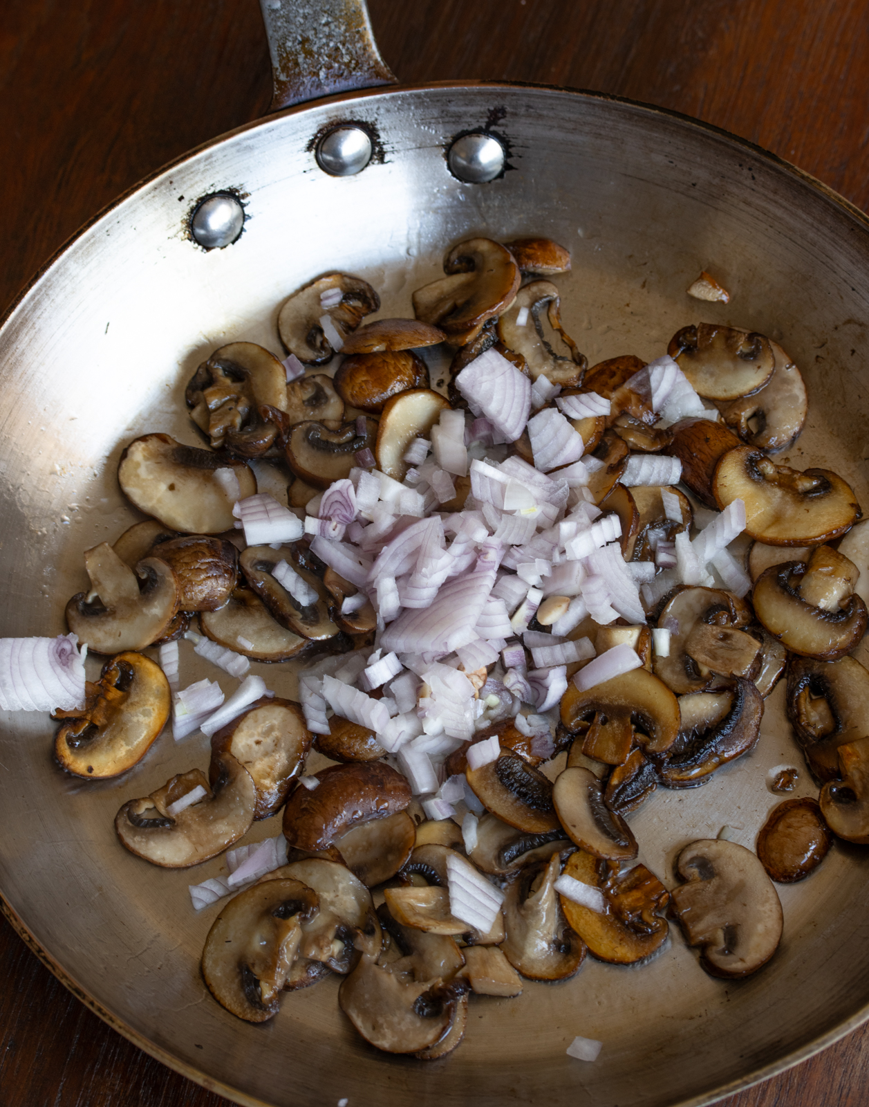 minced sshallots added to the mushrooms