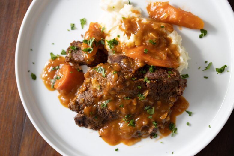 pot roast on a white serving dish